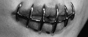 Sewn mouth. Mouth sealed with piercing.