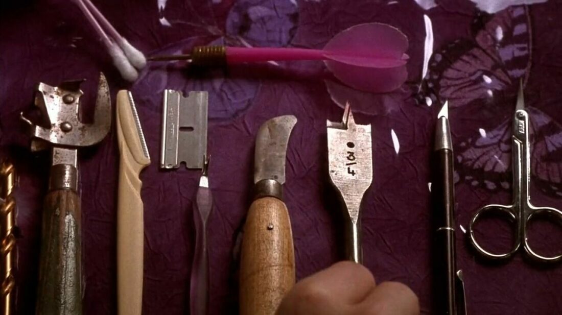 Self harm tools. Screenshot from Secretary movie, 2002